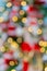 Abstract festive blurry background. Beautiful bokeh. Camera lenses effect.