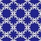 Abstract festive Christmas snowflake pattern on blue background