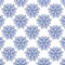 Abstract festive Christmas snowflake pattern on blue background