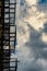 Abstract Fire escape silhouette and cloudy skies