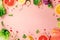 Abstract food background with ingredients such as fruits sweets and berries in pastel colors.