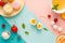Abstract food background with ingredients such as fruits sweets and berries in pastel colors.