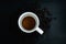 Abstract frosted glass image on Top view of Instant coffee in cup on dark background with beans