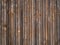 The abstract geometric background of narrow wooden aged slats