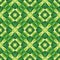 Abstract geometric background - seamless vector pattern in green colors. Ethnic boho style. Mosaic ornament structure.