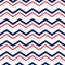 Abstract geometric chevron seamless pattern in blue red and white, vector