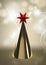 Abstract geometric conical christmas tree in golden color and red star