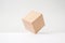 Abstract geometric real wooden cube with surreal layout on white background