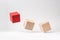 Abstract geometric real wooden cube with surreal layout on white floor background, the symbol of leadership, teamwork and growth
