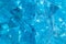Abstract glass texture. A network of cracks on a piece of classic blue color glass. Can be used as background. Classic blue color