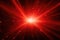 Abstract glowing red light effect with sparkling rays