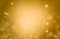 Abstract gold bokeh defocused glitter texture christmas with light bokeh background