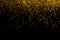 Abstract gold defocused glitter holiday background on black. Falling shiny sparkles. New year Christmas glowing backdrop