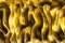 Abstract gold metallic fabric waving shape
