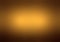 Abstract gradient background in gold tone.