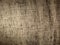 Abstract gradient high contrast backlit burlap background