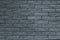 Abstract gray pattern of brick wall background. Light grey stone background. Grey bricks texture wallpaper backdrop of house facad