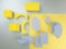 Abstract gray yellow wooden geometric 3D figures: rectangle,square,segment of circle,arcs,trend colored paper backdrop