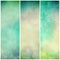 Abstract green background banners or striped designs in soft mottled white and beige watercolor grunge texture stains