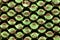 abstract green-black background with beads that reflect colors differently, they are all similar, modern futuristic design