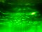 Abstract Green Particle Swirl Defocused Background - Nature