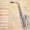 Abstract grunge background with saxophone