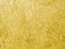 Abstract grunge background wallpaper of yellow gold cement wall loft style.