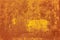 Abstract grunge surface orange bronze gold background golden yellow highlights