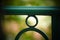 Abstract handrail with a dreamy, green background