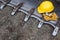 Abstract Hardhat, Gloves and Protective Glasses Resting on Bulldozer Bucket