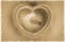 Abstract heart-shaped on old brown paper background