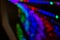abstract holiday lamps unfocused colorful illumination on black background space Christmas theme