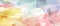 Abstract horizontal watercolor background. Bright colorful hand painted stains in beige, yellow, ivory, pink, blue.