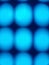 abstract image of a kind of blue net with.  several holes.