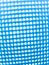 abstract image of a kind of blue net with.  several holes.
