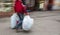 Abstract image of a man in sportswear with shopping plastic bags