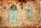 Abstract image of old house\'s wall from jerusalem stone with old blue balcony. filtered and textured image