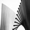 Abstract imagery of bent steel poles in grayscale for wallpaper or background