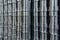 Abstract industrial shiny steel production stack full frame background with cnc machined pipes - selective focus and