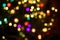 Abstract light celebration background with defocused golden lights for Christmas, New Year, Holiday