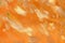 Abstract light orange natural acrylic ink art painted wave texture with brush stroke marble modern fluid mixing pattern on orange