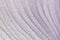 Abstract light purple picture. Toned photo of curved ice stripes. Unusual background for layouts and sites