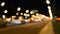 Abstract lights of traffic in the night. Blurred, not in focus, intentionally.