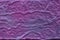 Abstract lilac coloured surface on stone