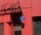 Abstract look at red painted building with storage sign