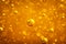 Abstract macro honey bubbles closeup in bright amber color. The texture of the honey. Healthy food concept. Diet
