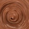 Abstract milk chocolate swirl background