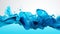 Abstract minimalistic wallpaper with splash wave of blue paint. Viscous liquid