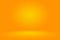 Abstract mockup smooth orange gradient studio room wall background.