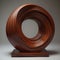 Abstract modern cocobolo wooden sculpture with mainly round shapes.
